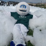 Herriman Yeti sitting in foam in a park