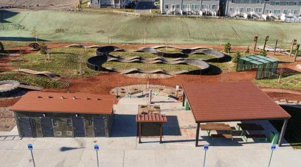 Aerial image showing the Juniper Canyon east trailhead with bike amenities, restroom, and pavilion.