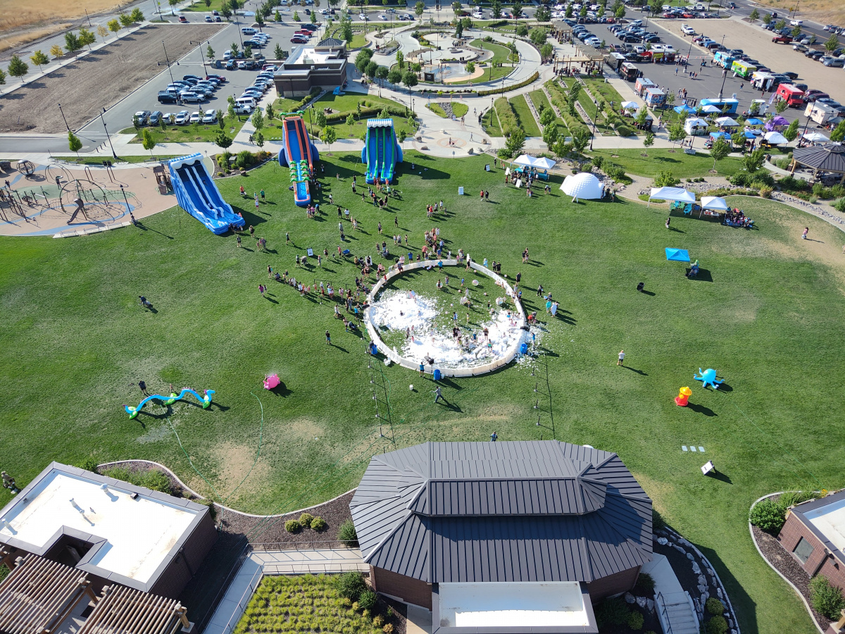 Children playing in foam at a past Yeti Foam Party