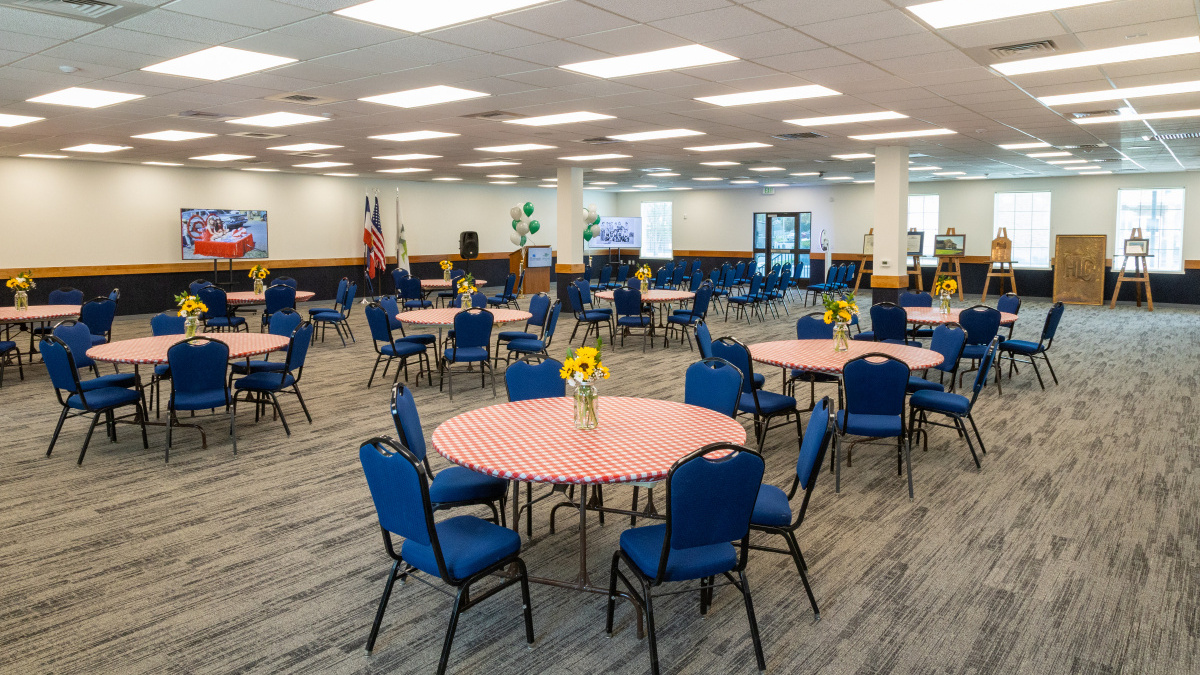 Community Room configured with tables and chairs